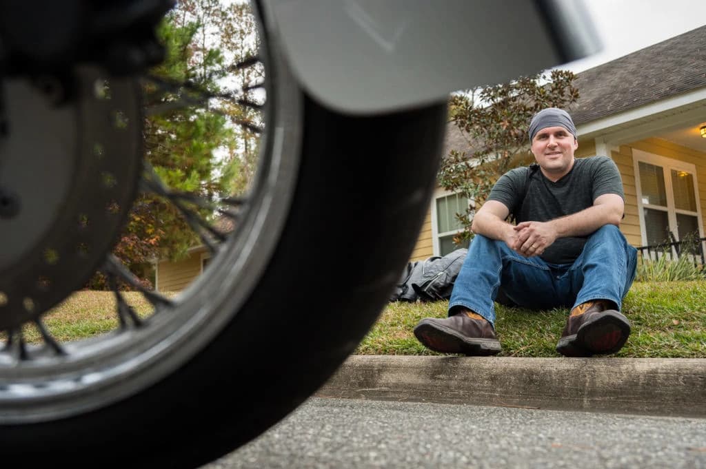 Novocure corporate team collaborating in a modern office with digital tablet