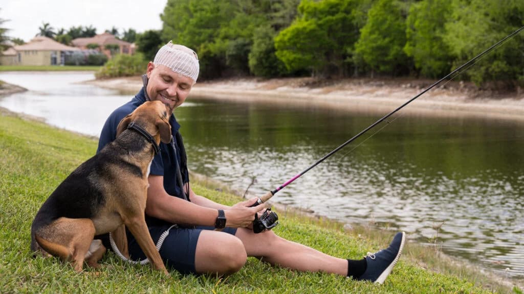 Smiling professional businessman wearing a blue suit and glasses