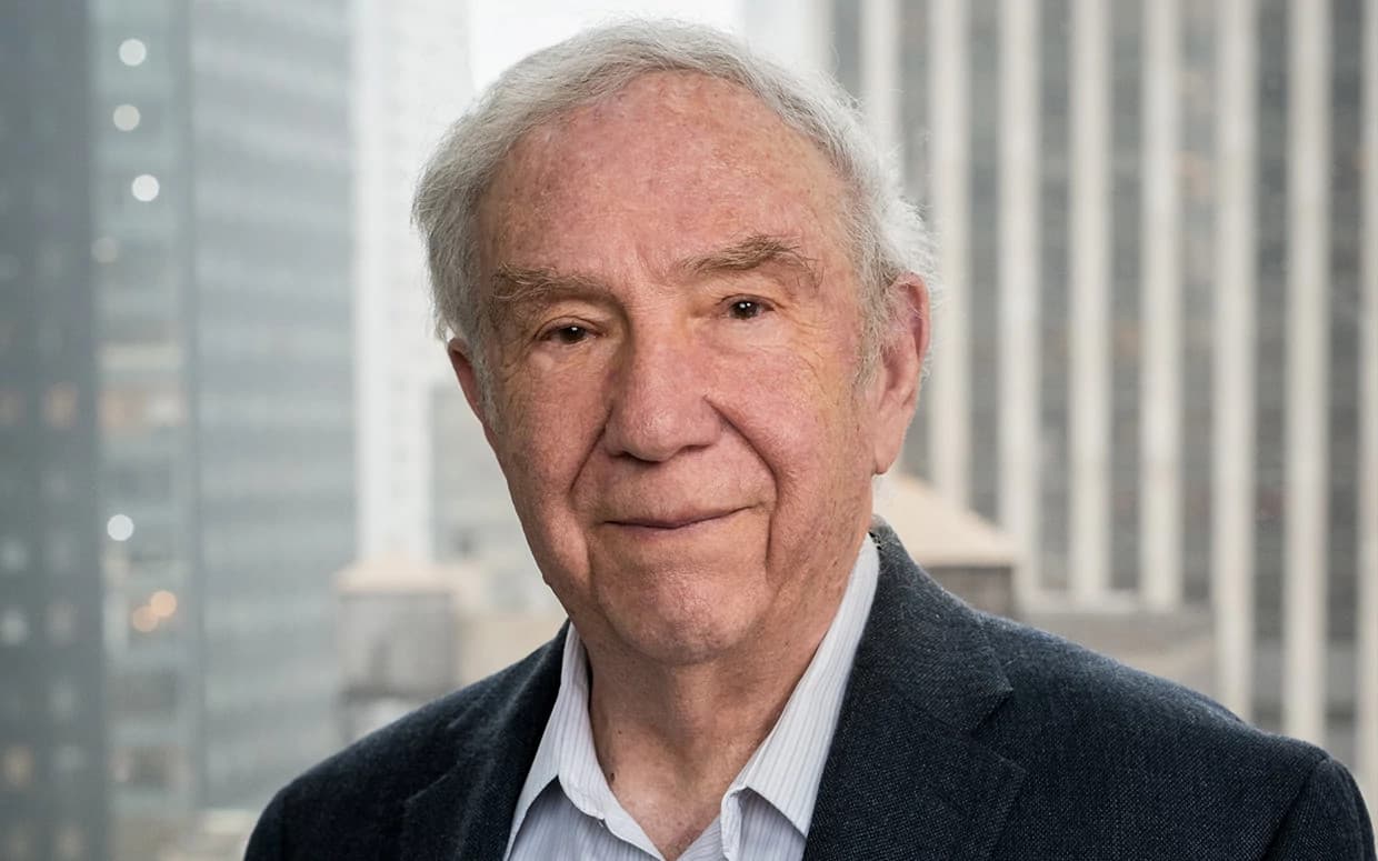 Portrait of a confident middle-aged man smiling in a professional setting