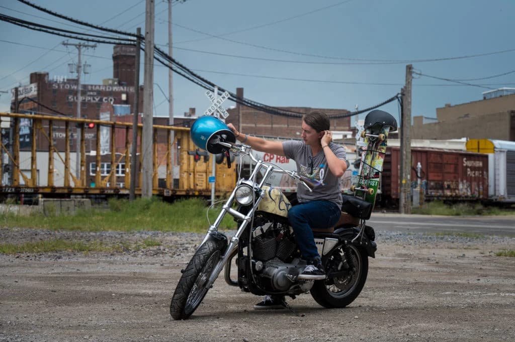 Two scientists in lab coats working together in a modern laboratory with advanced medical equipment